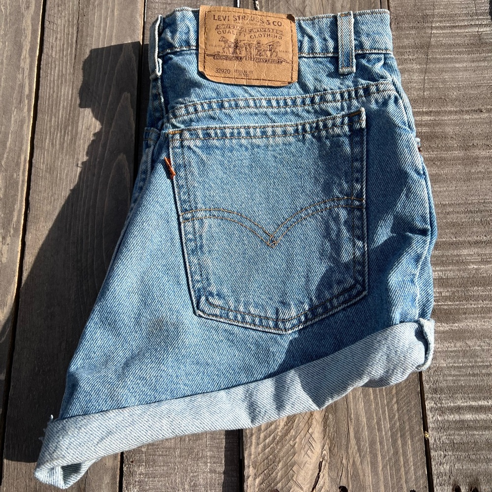 Reworked vintage Levi lightwash shorts. Raw folded hem, original Levi patch